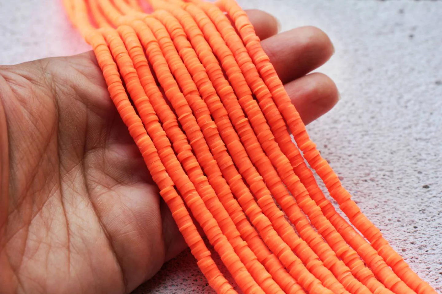 neon-orange-heishi-disc-surfer-beads.