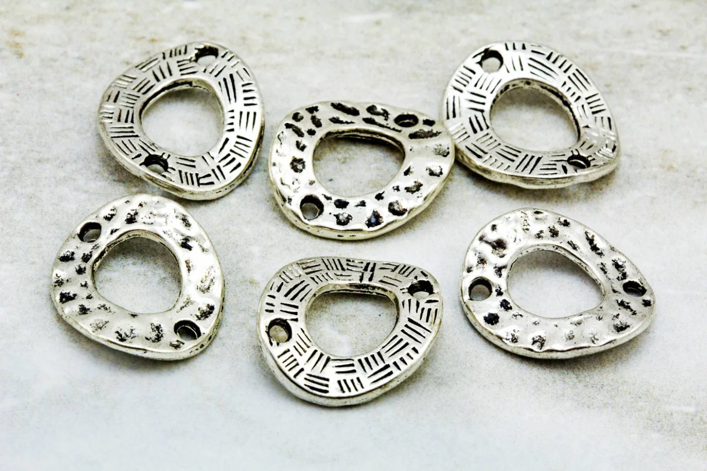 curved-ring-silver-jewelry-charms.