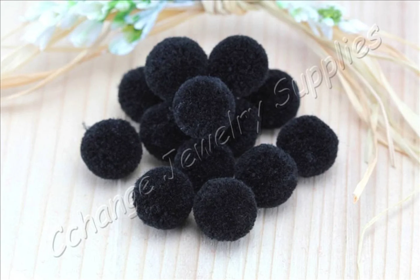 handmade-cotton-pompoms-black.