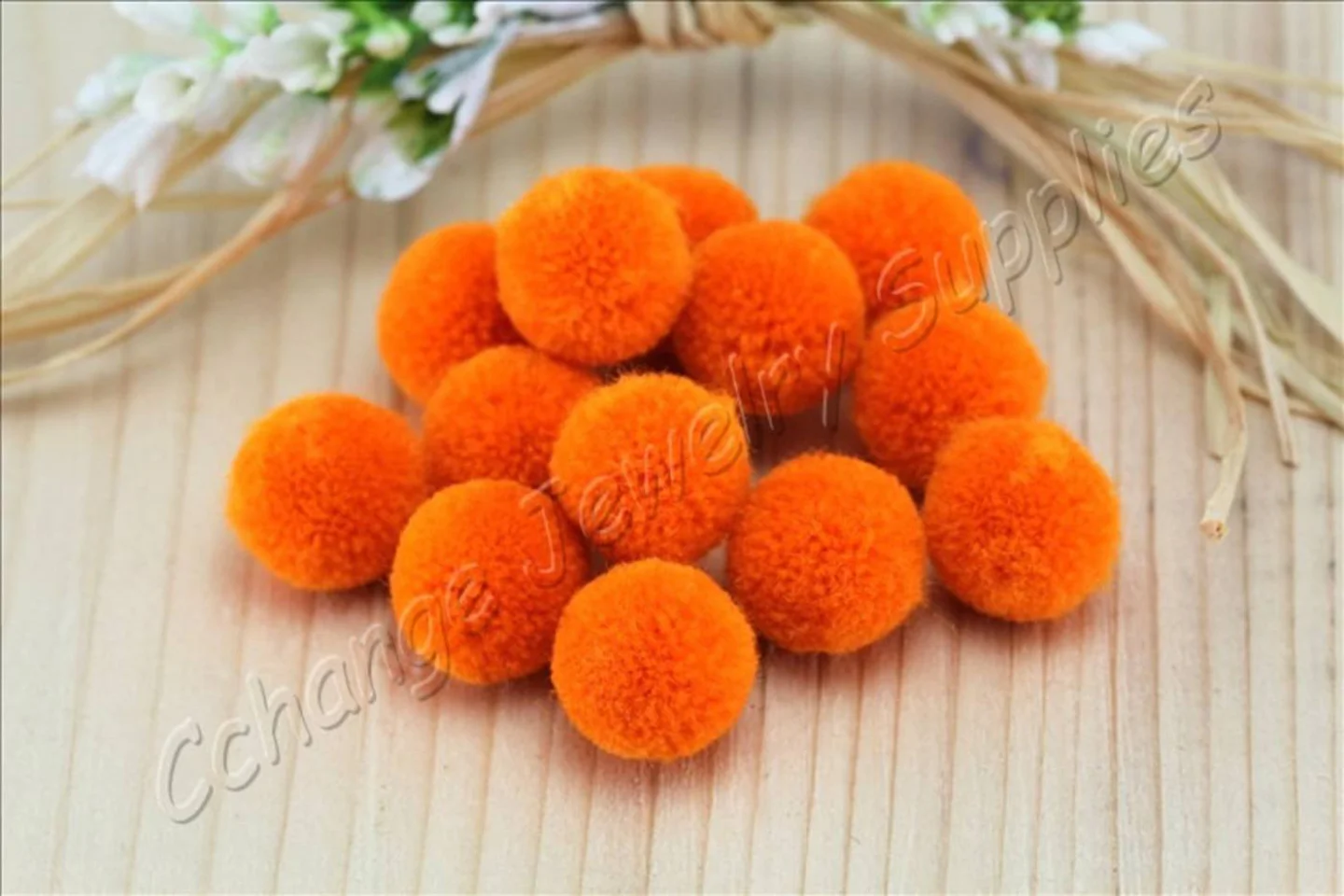 handmade-cotton-pompoms-orange.