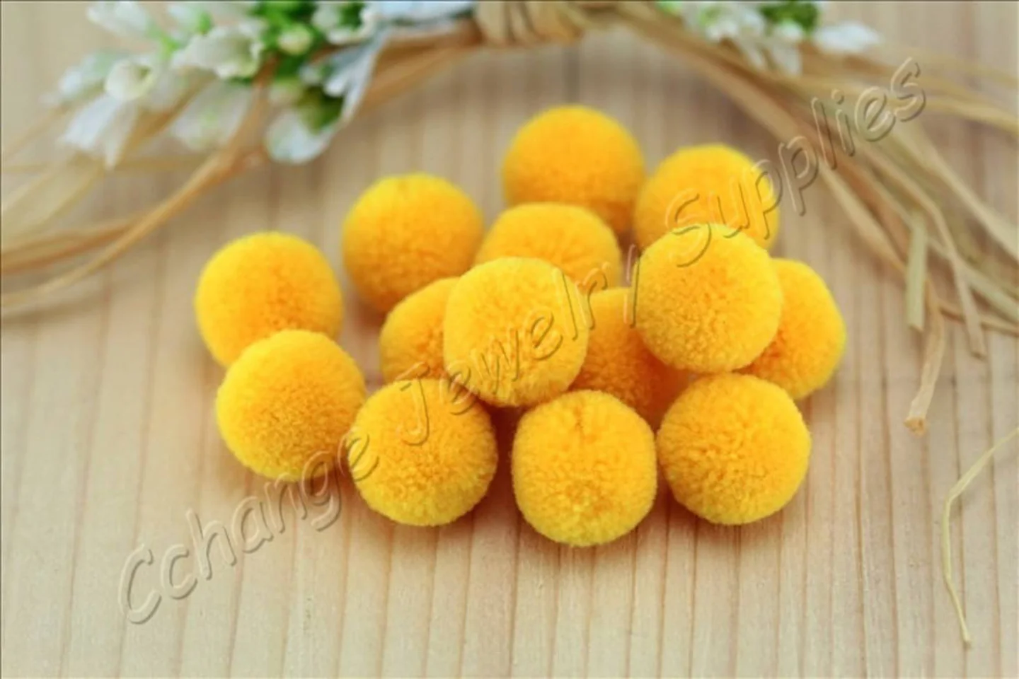 handmade-cotton-pompoms-yellow.