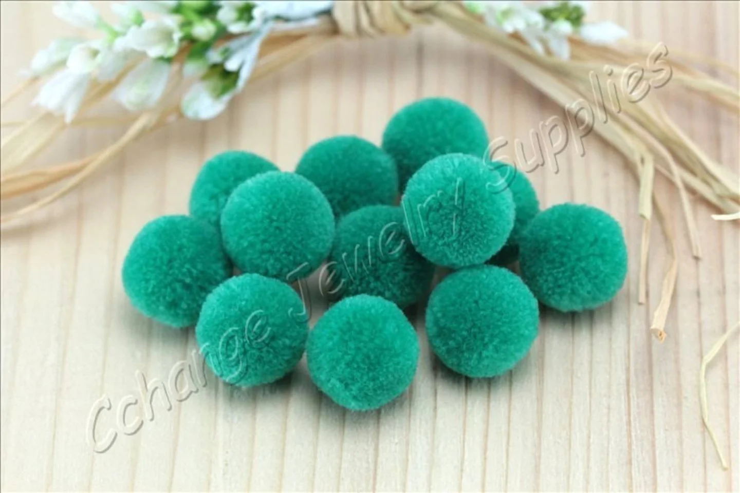 handmade-cotton-pompoms-green.