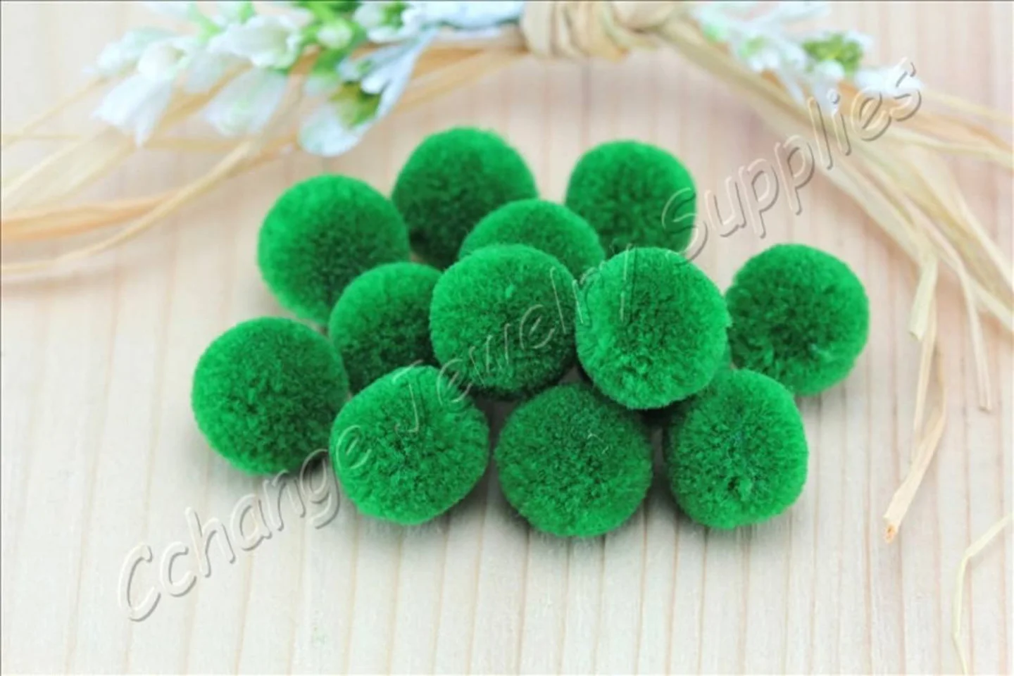 mini-handmade-cotton-pompoms-green.