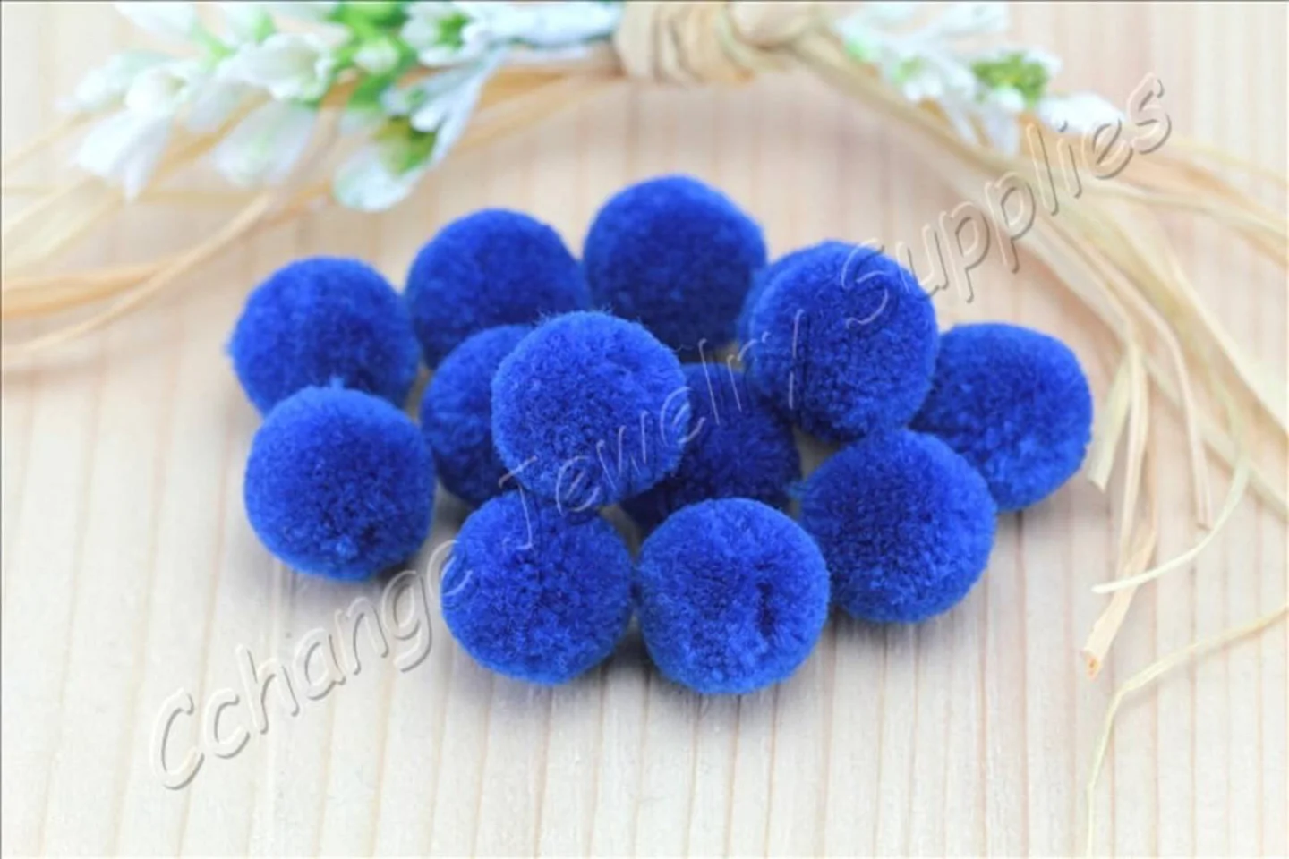handmade-cotton-pompoms-dark-blue.