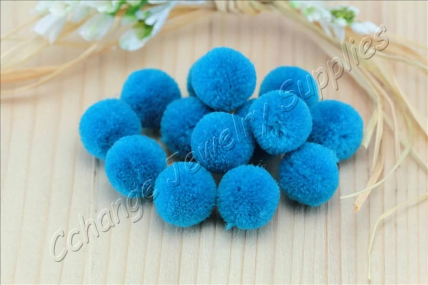 handmade-cotton-pompoms-blue-sapphire.