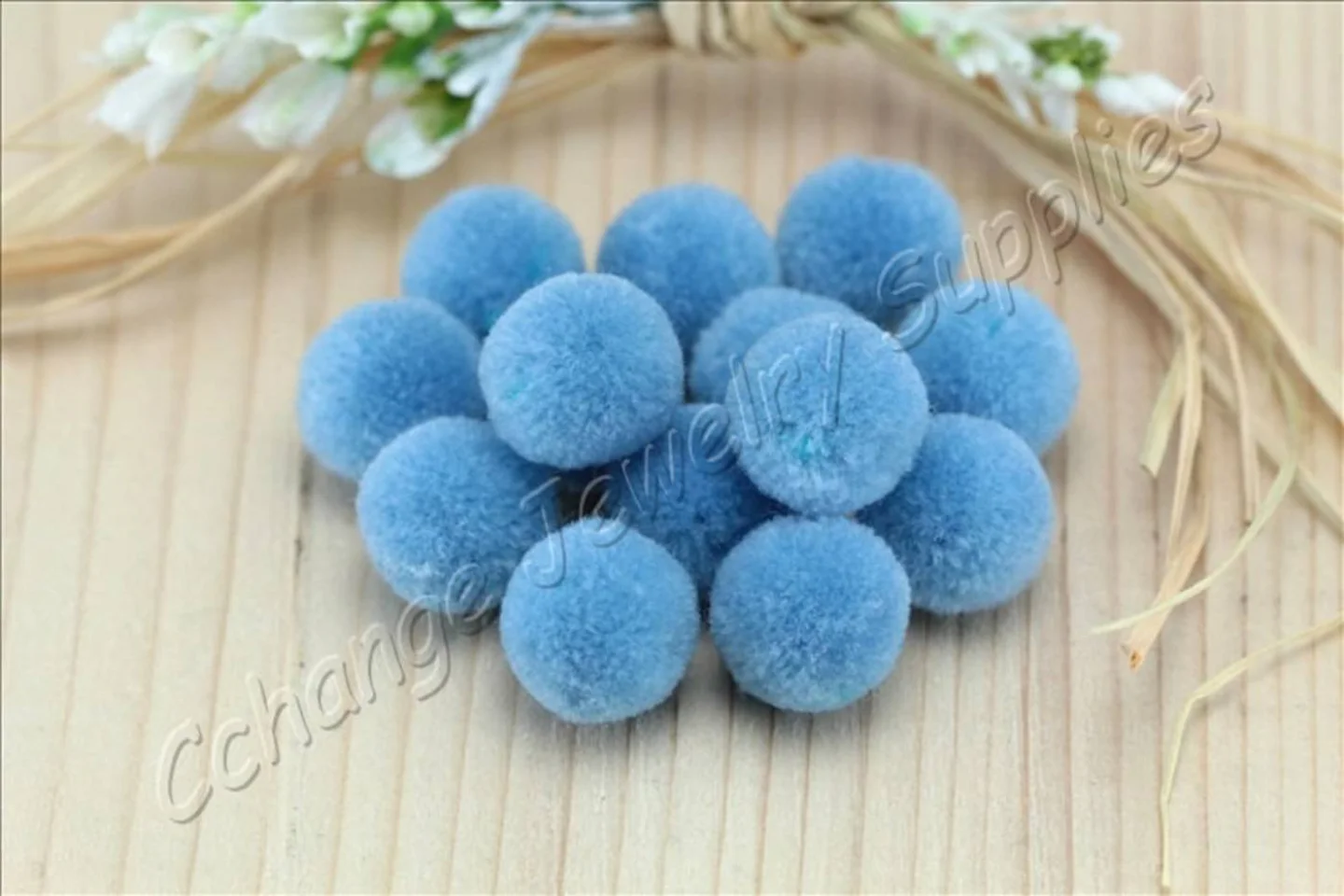 handmade-cotton-pompoms-light-blue.
