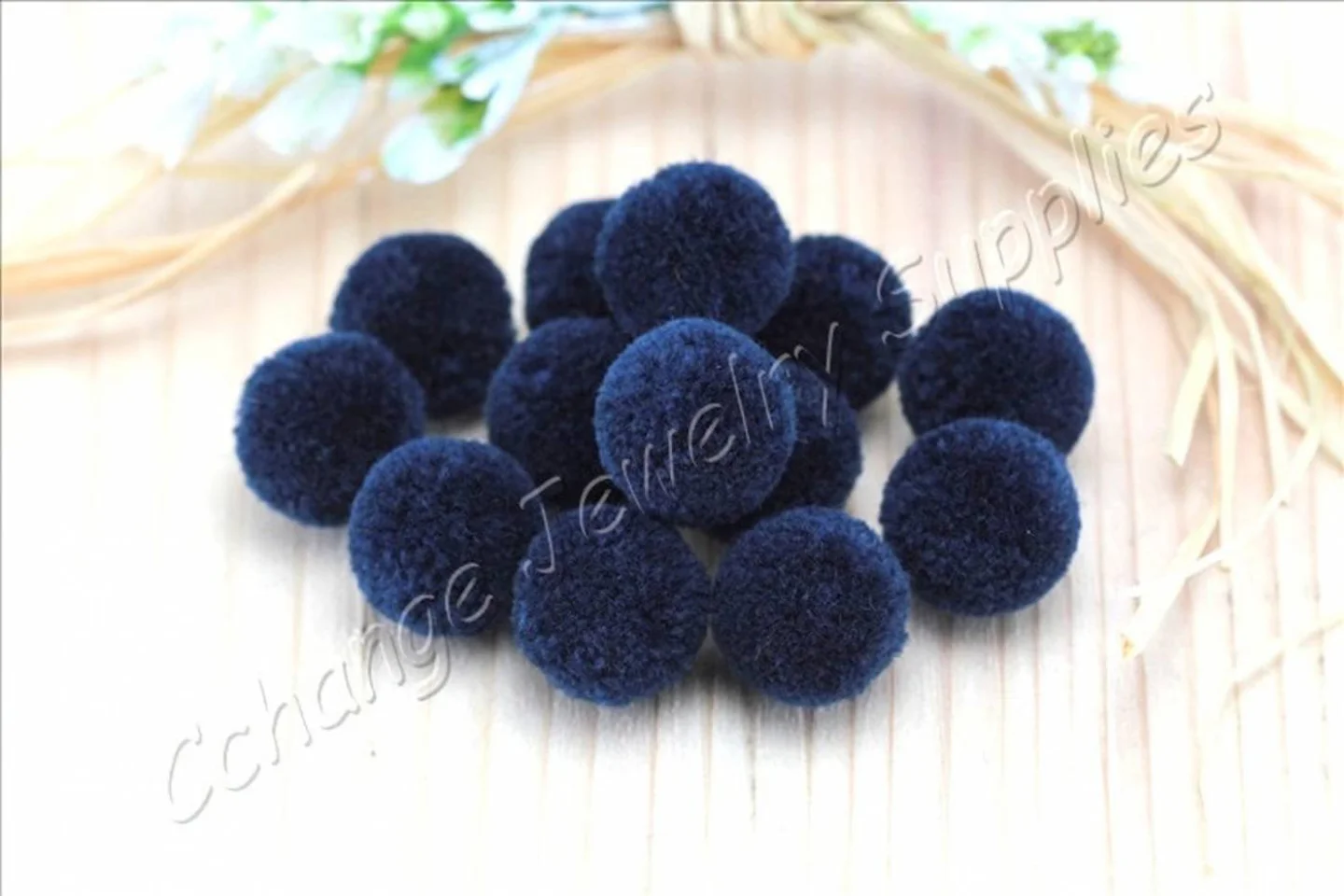 handmade-cotton-pompoms-navy-blue.