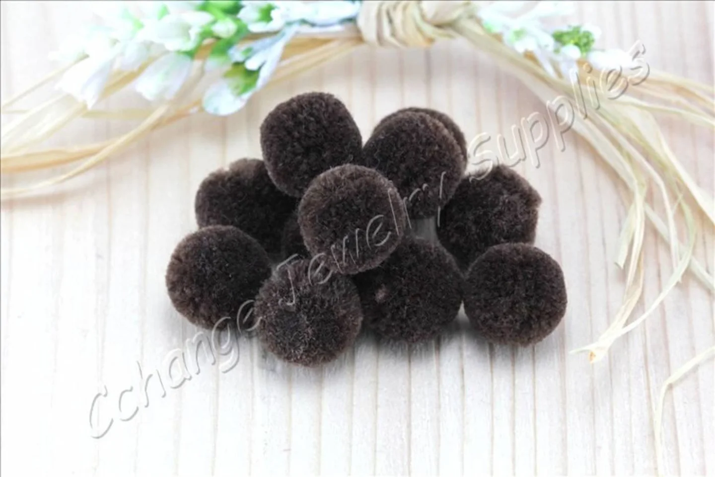 handmade-cotton-pompoms-dark-brown.