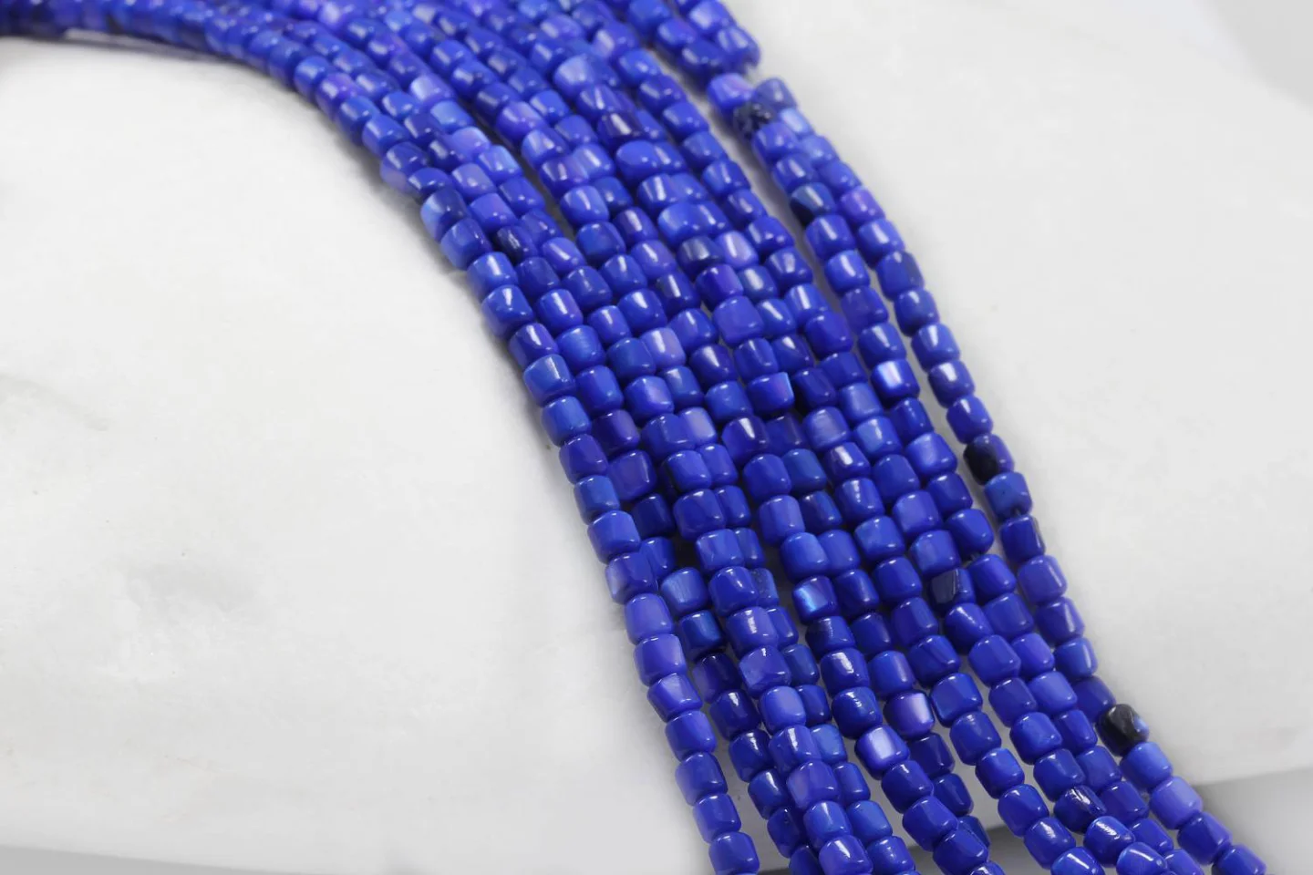 3mm-barrel-saxe-blue-shell-beads.