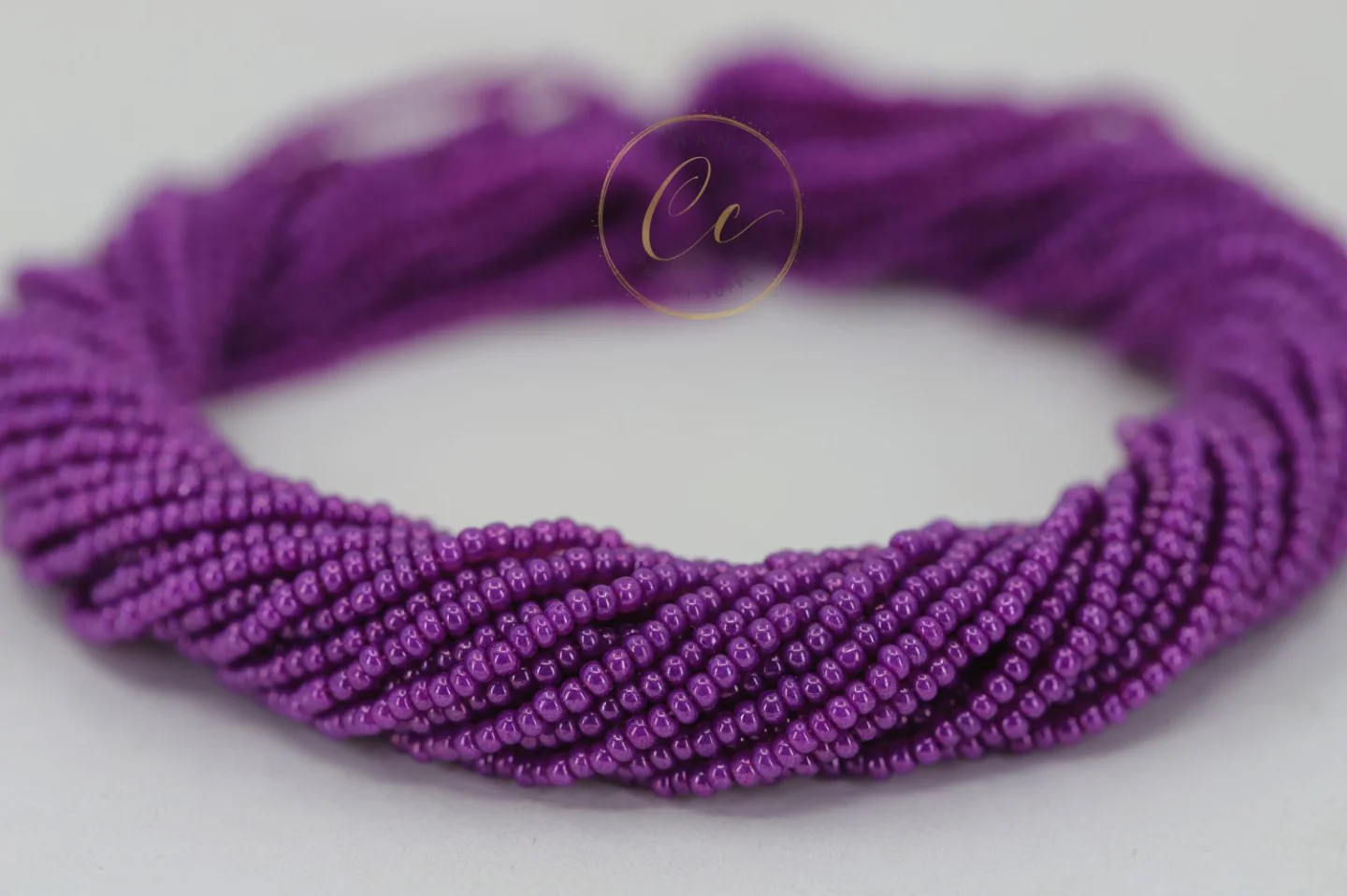 dark-purple-czech-seed-bead-17125.