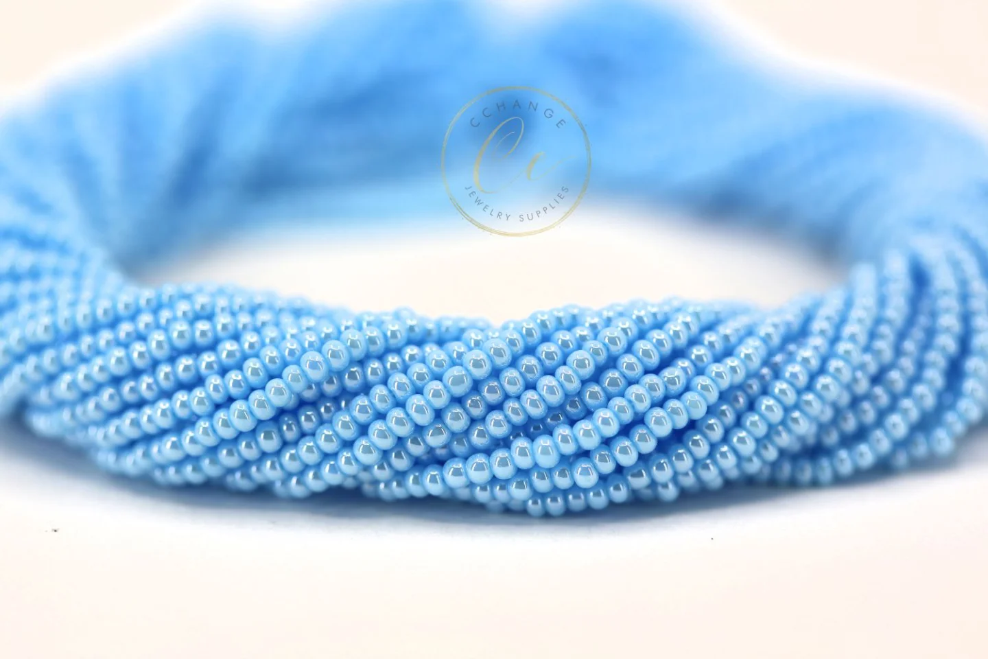 shiny-baby-blue-czech-seed-beads-68000.