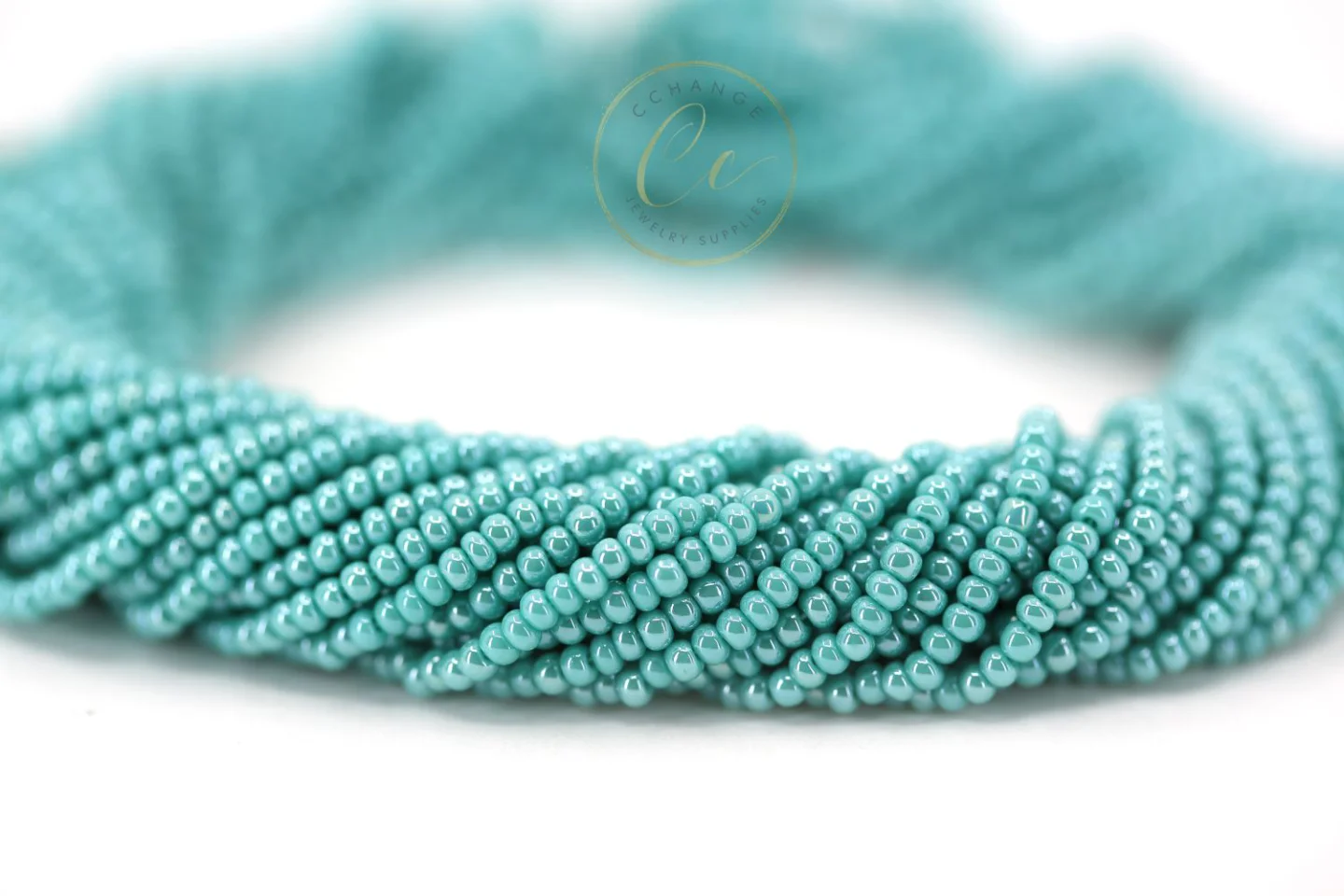 shiny-turquoise-czech-seed-beads-68130.