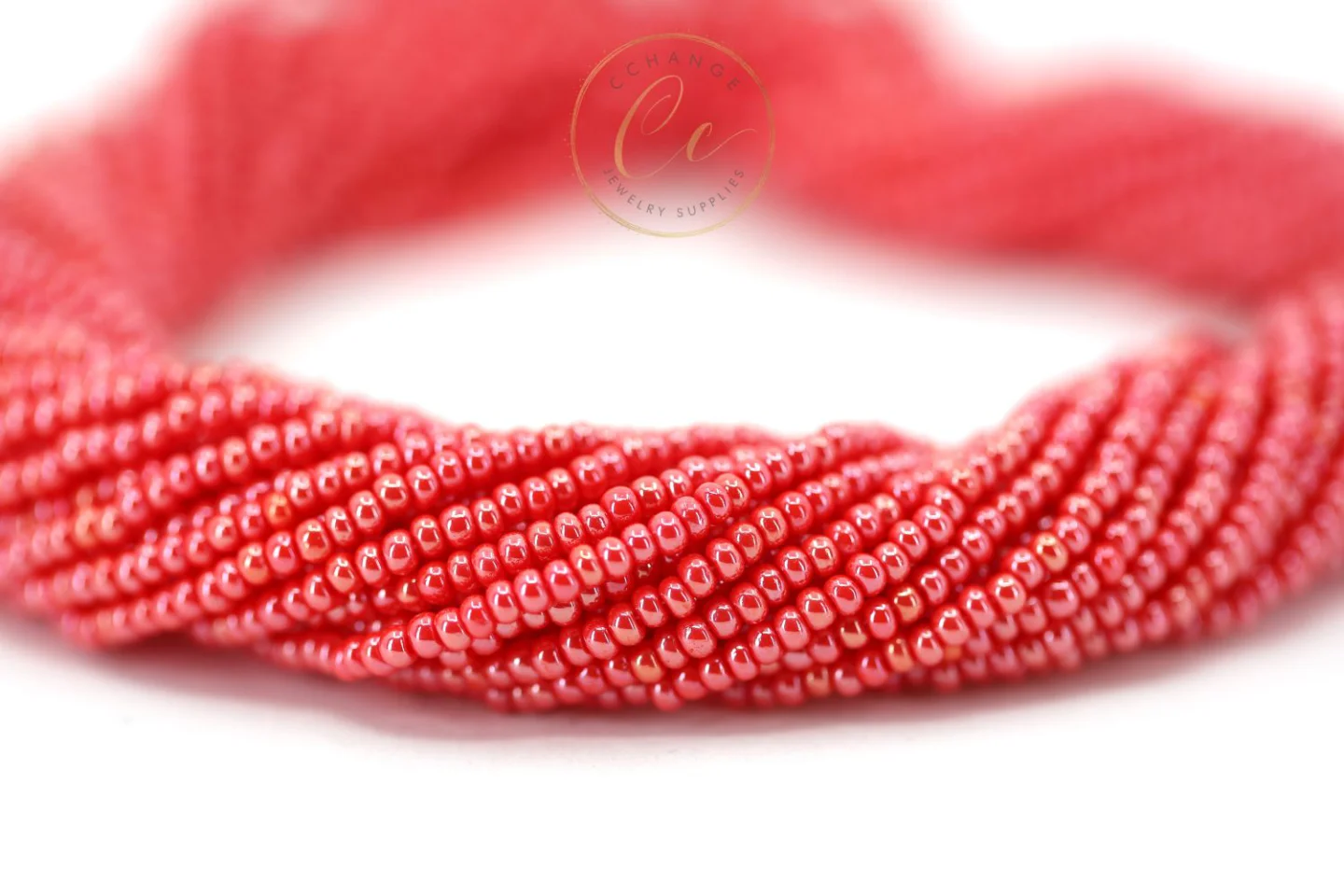 coral-red-czech-seed-beads-hank.