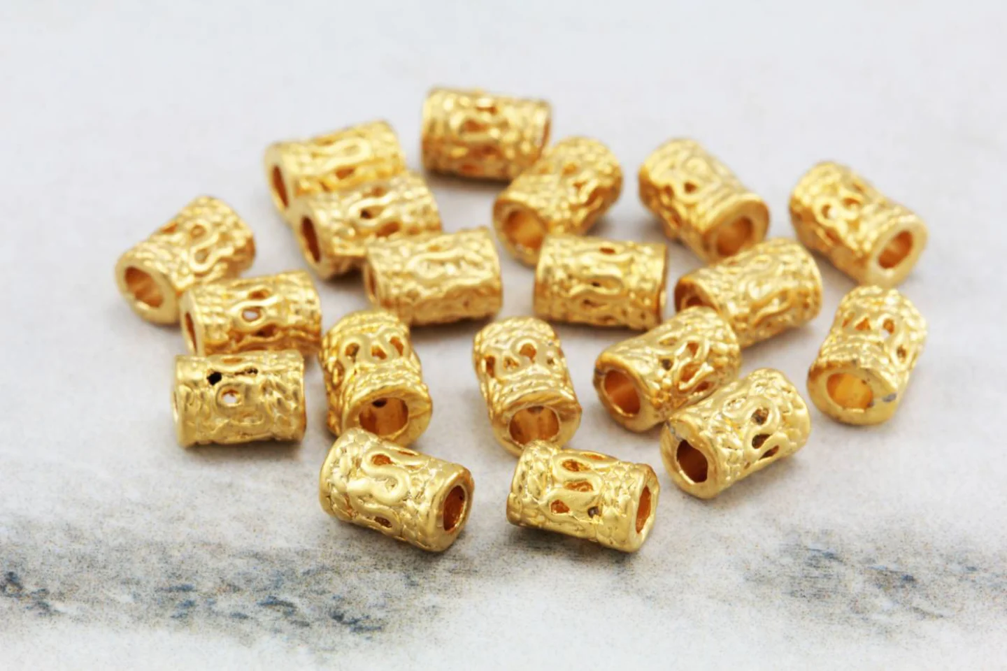 mini-gold-tube-filigree-spacer-beads.