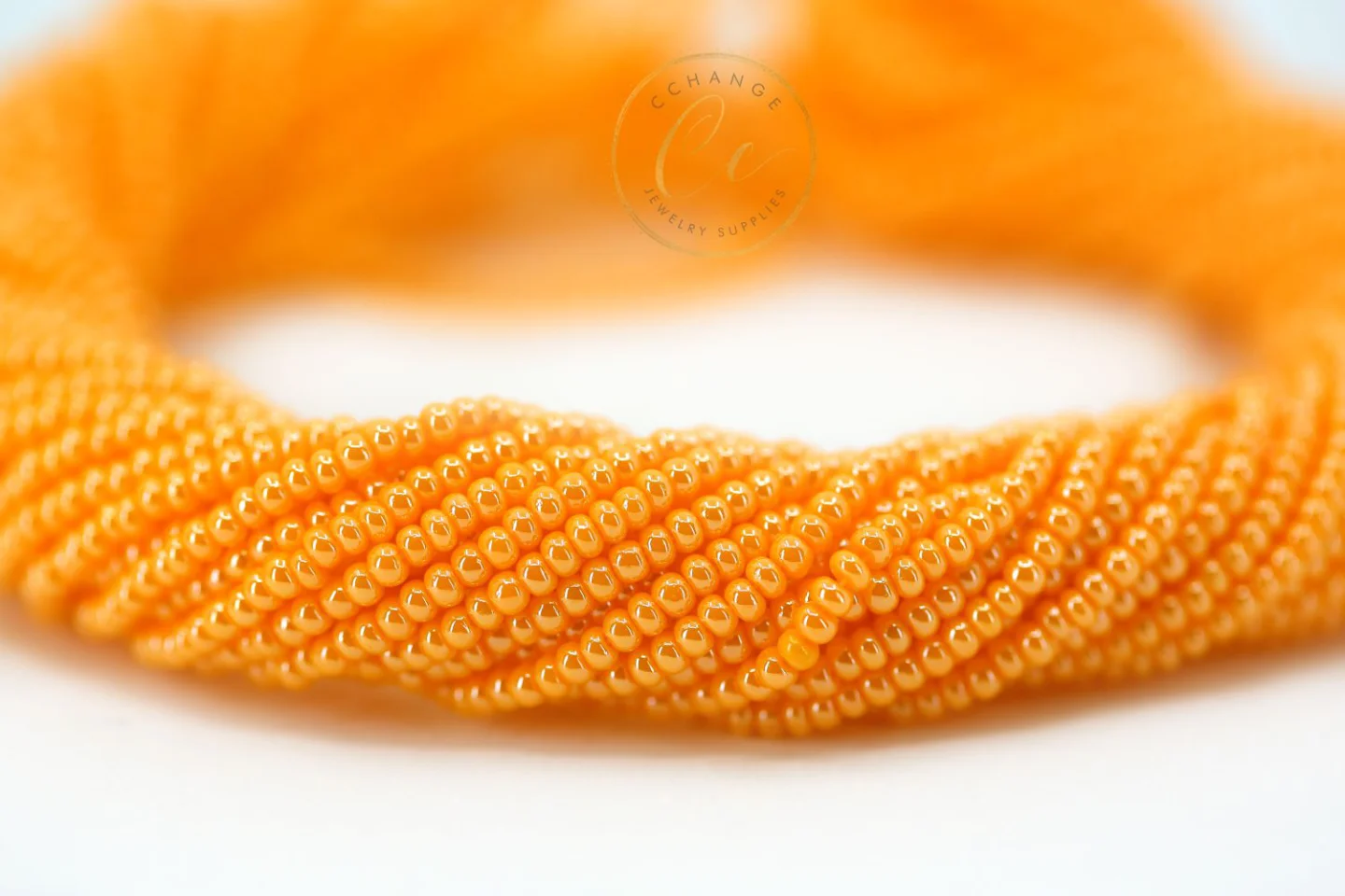shiny-orange-czech-seed-bead.