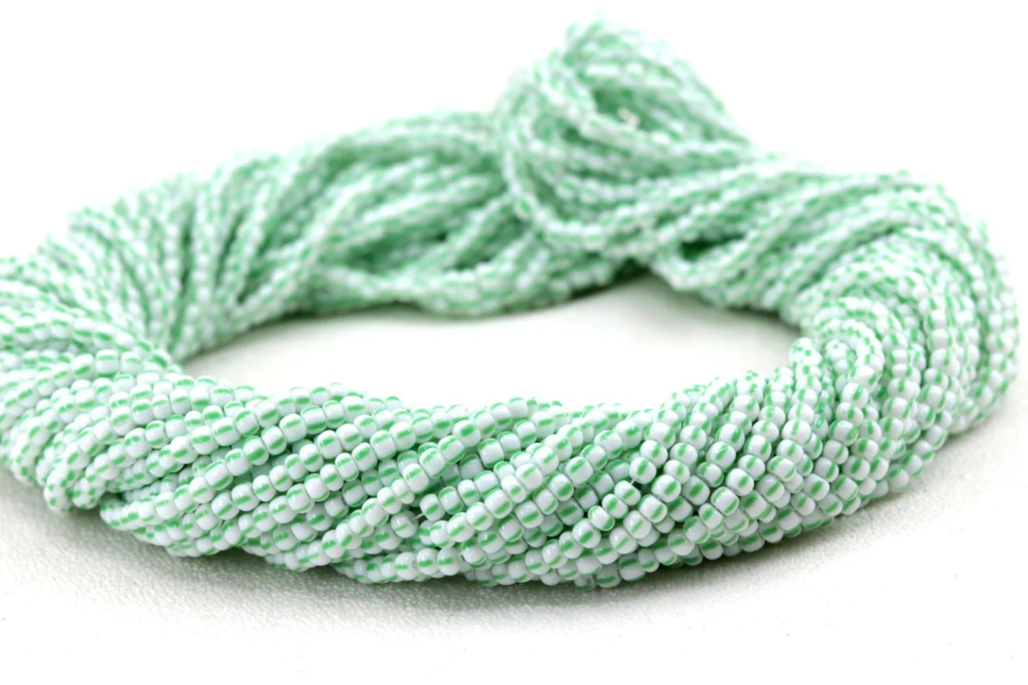 green-white-striped-czech-seed-beads.