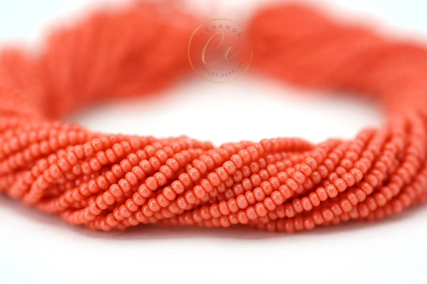 shiny-coral-czech-seed-beads-16A91.