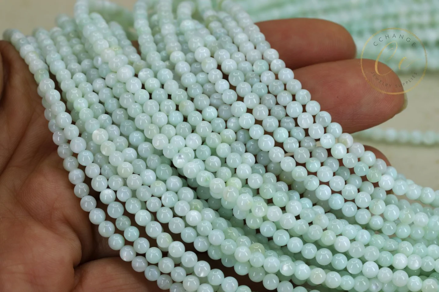 mini-mint-green-shell-round-beads.