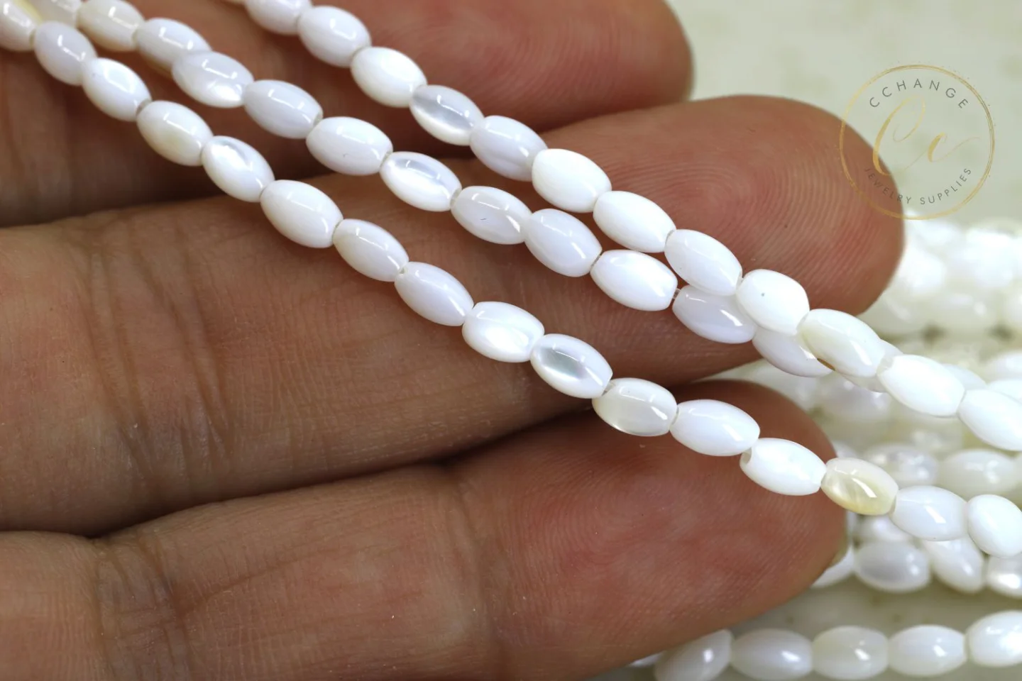 mini-oval-rice-mop-shell-beads.