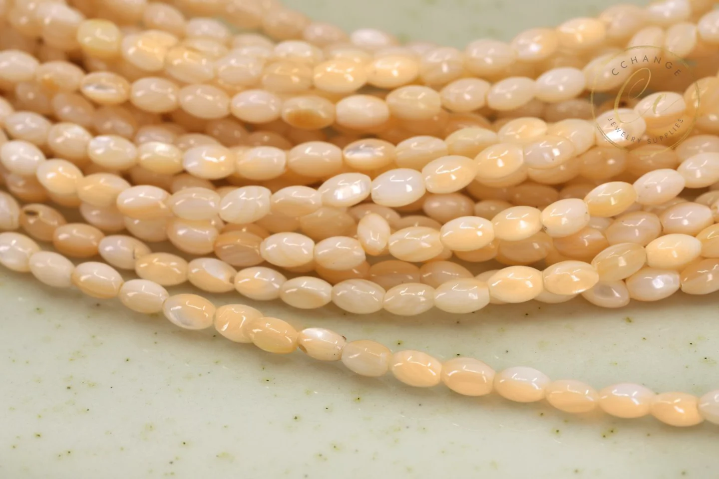 5mm-3mm-oval-shape-rice-mop-shell-beads.