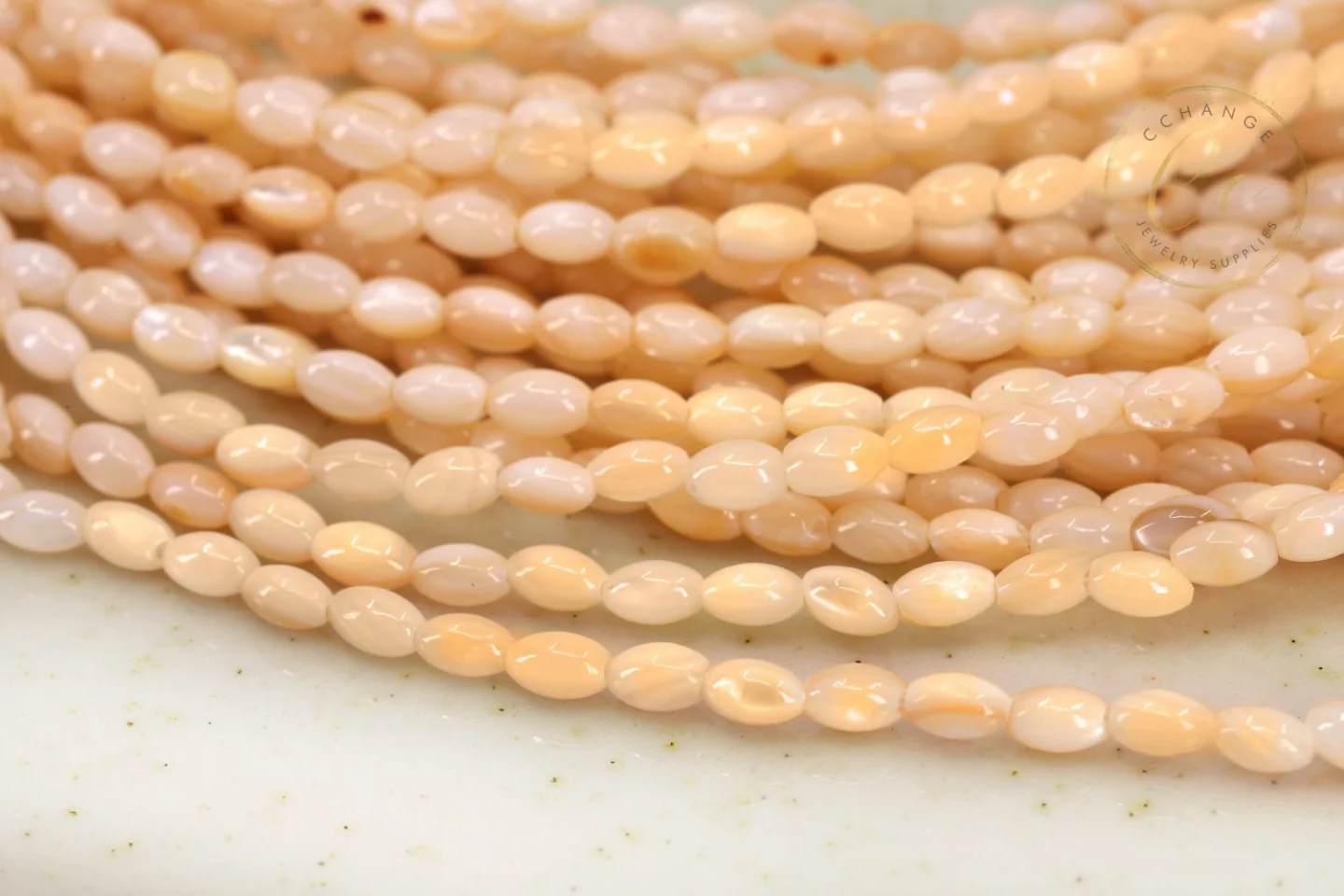 peach-orange-rice-shell-mop-beads.