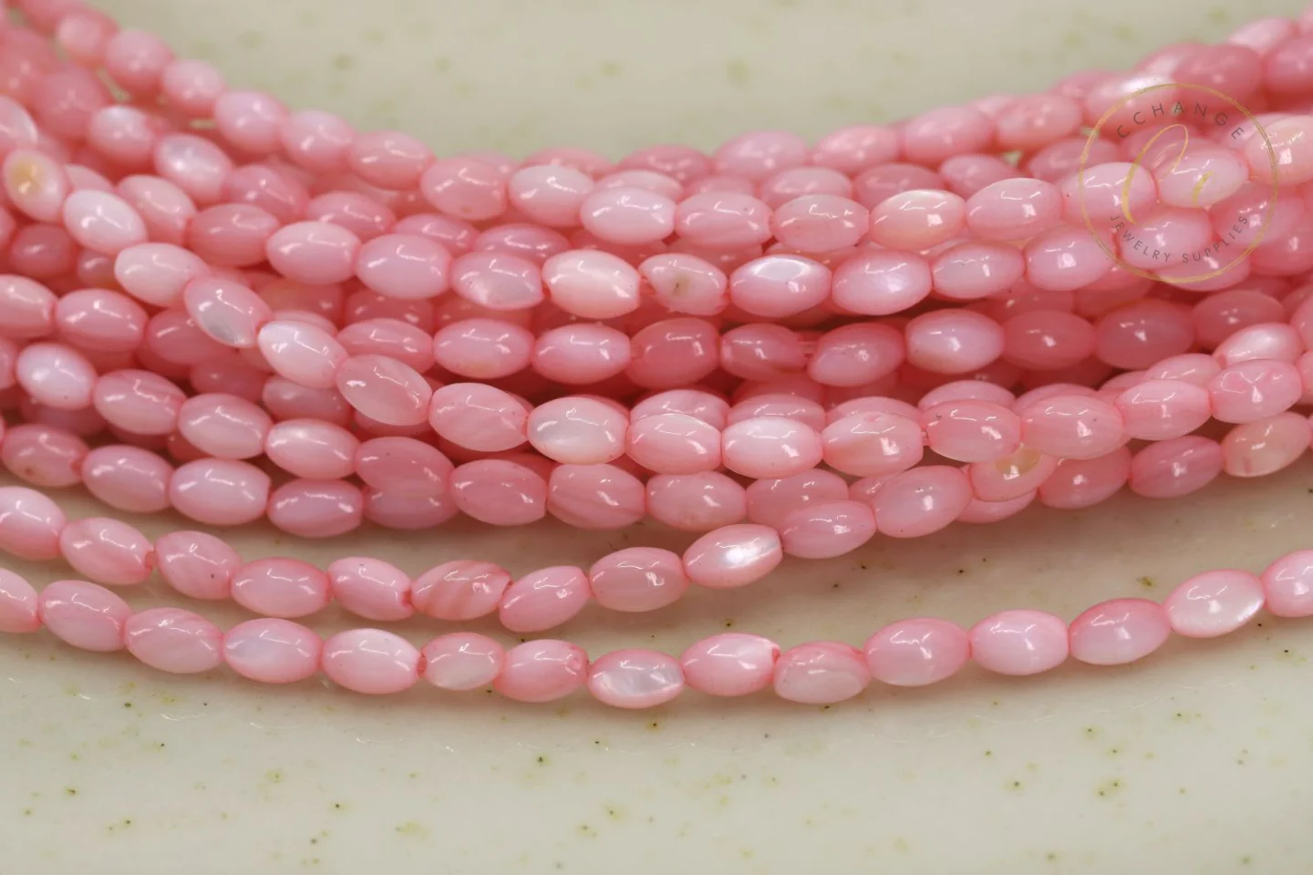 3mm-pink-rice-shell-mop-beads-strand.