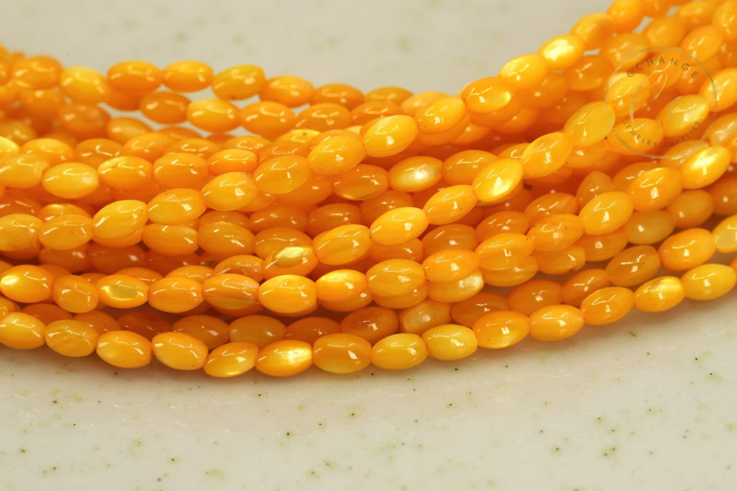 mini-oval-shape-rice-mop-shell-beads.