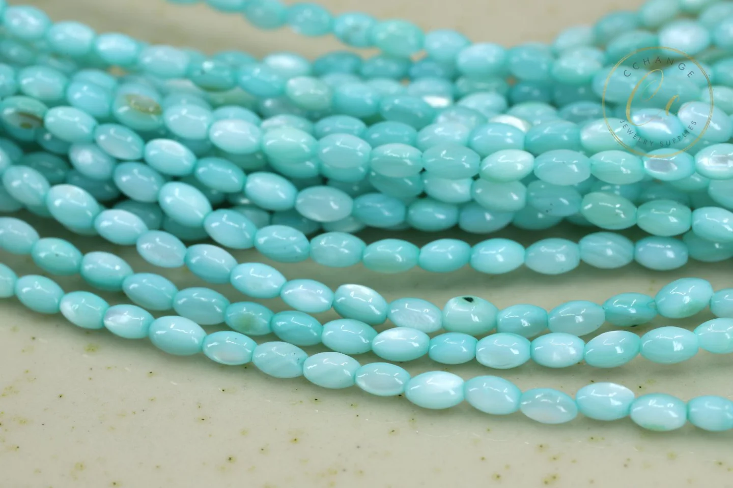 3mm-turquoise-rice-shell-mop-beads.