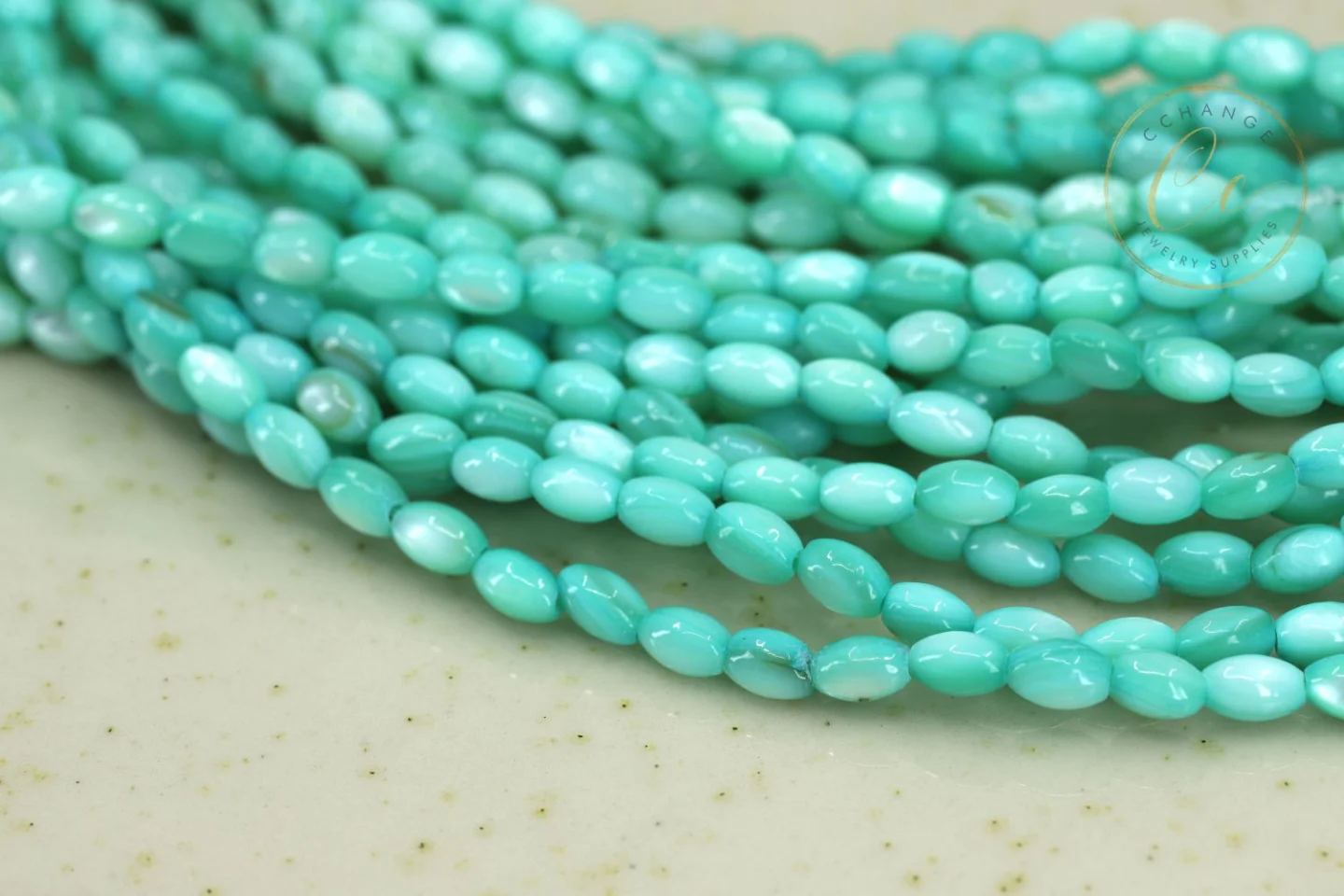 3mm-green-rice-shell-mop-beads.