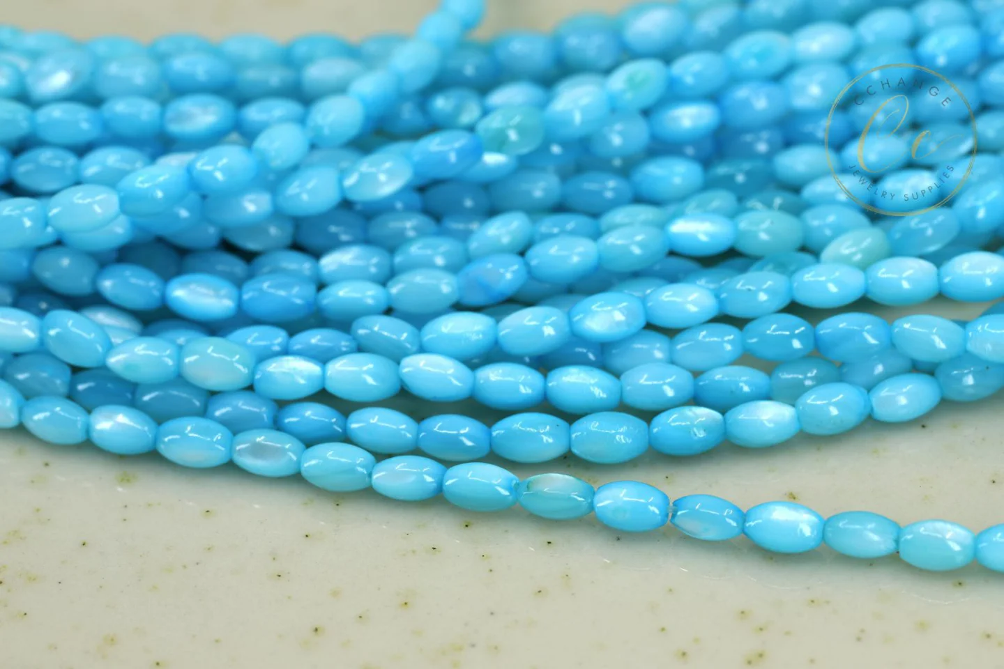 3mm-blue-rice-shell-mop-beads.