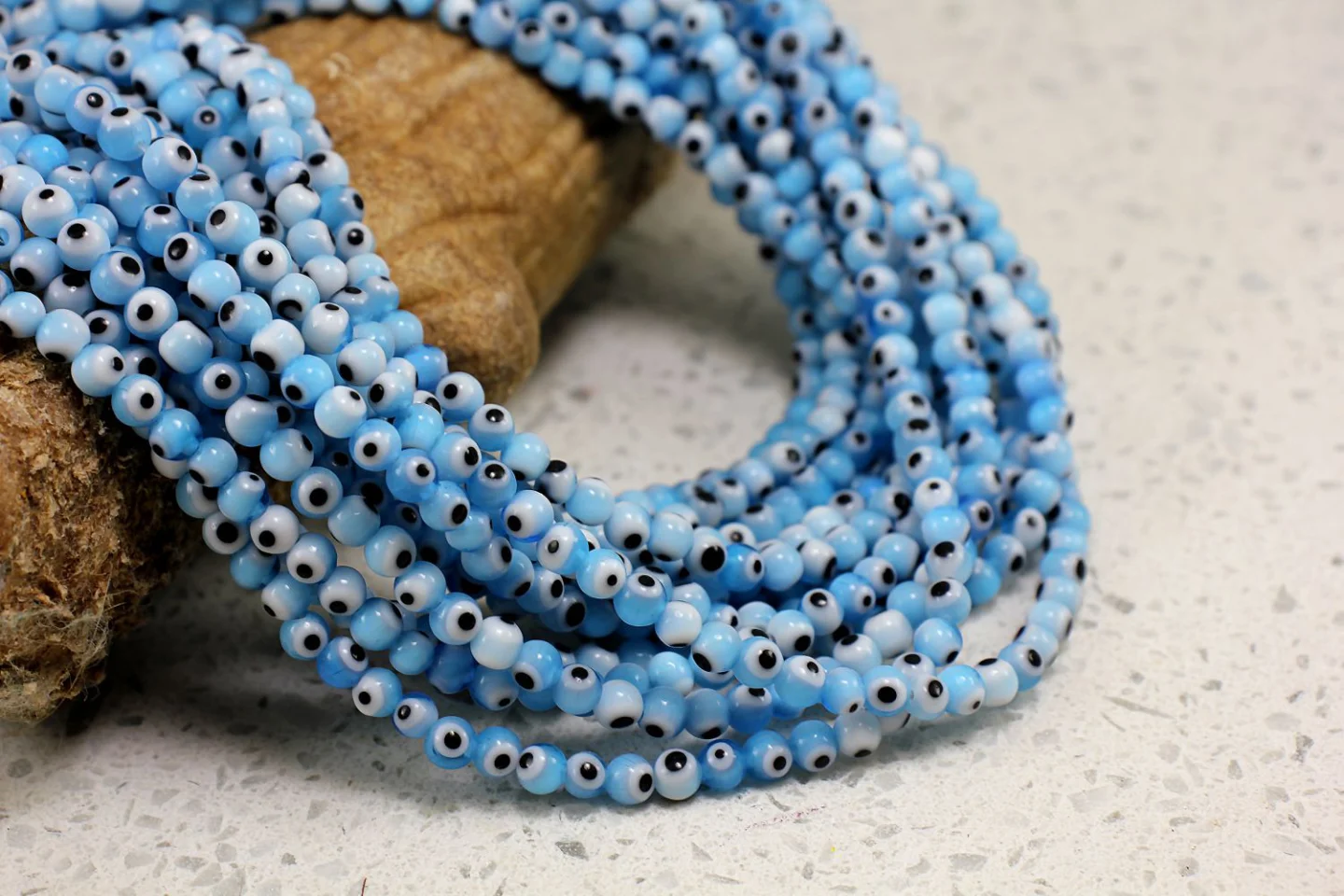 4mm-blue-glass-round-evil-eye-beads.