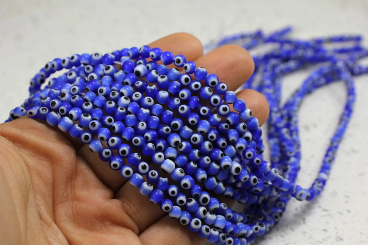 4mm-dark-blue-glass-round-evil-eye-bead.