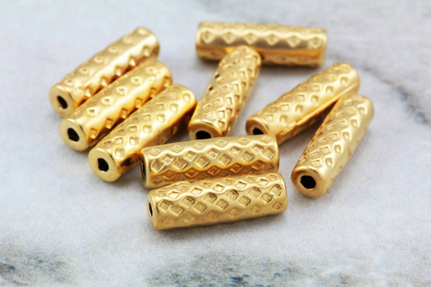gold-textured-metal-tube-spacer-beads.