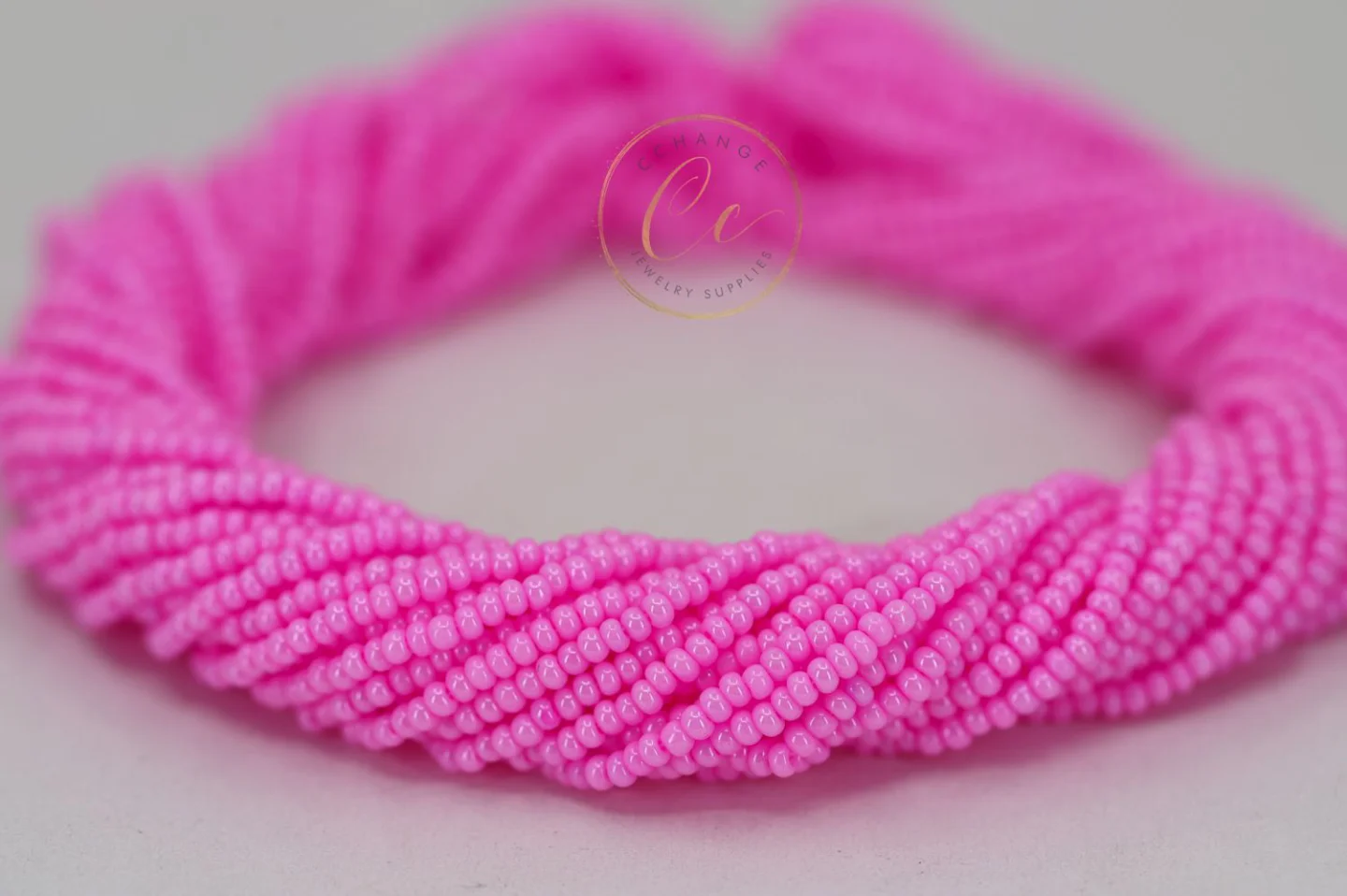 bright-pink-seed-bead-16173.