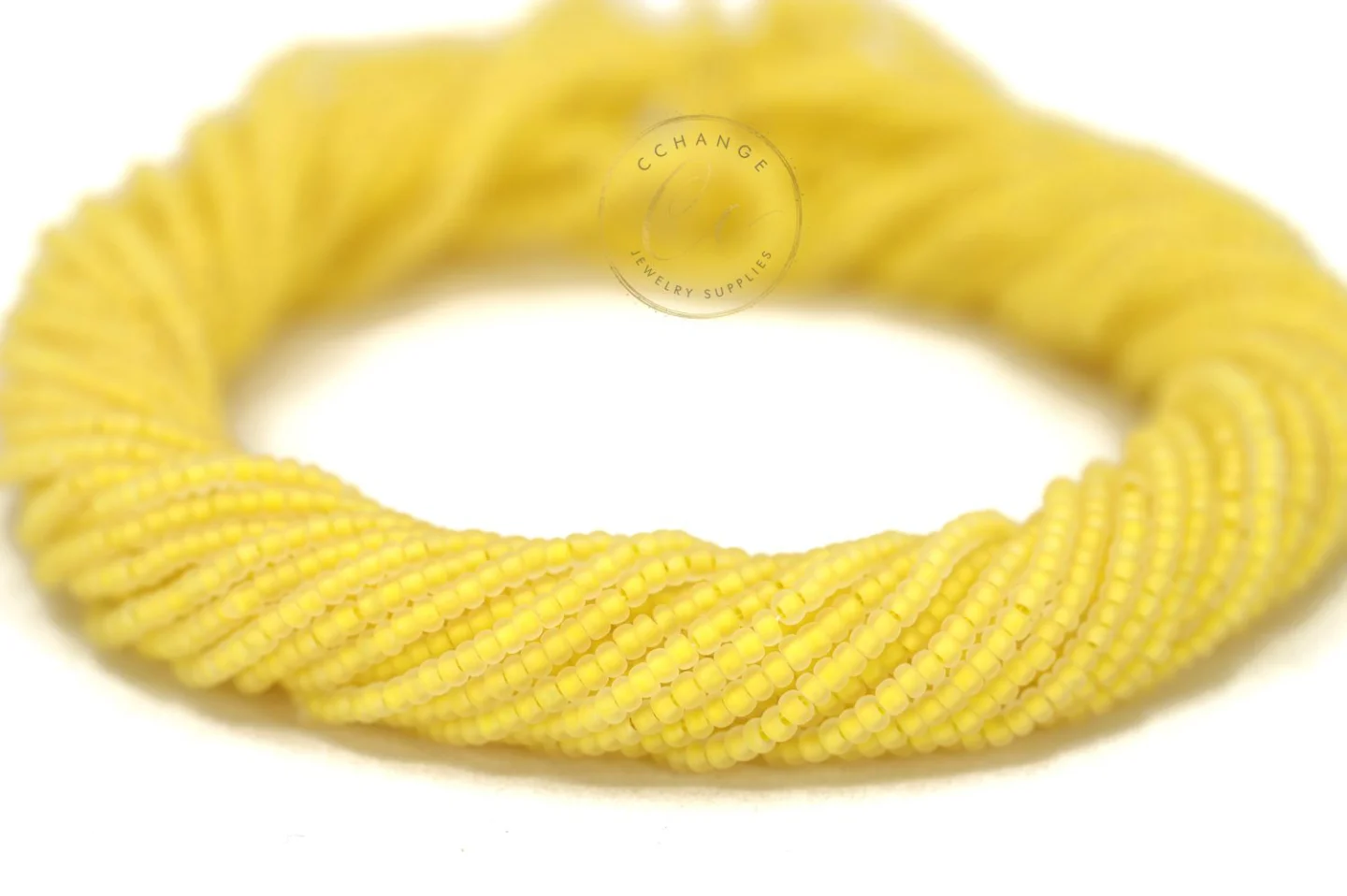 matte-yellow-line-transparent-seed-bead-.