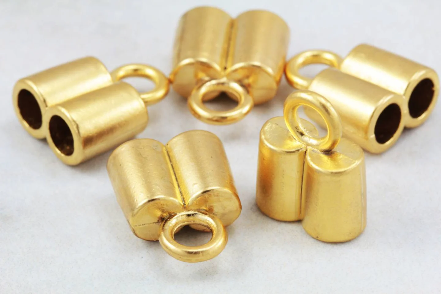 gold-plated-metal-double-hole-end-caps.