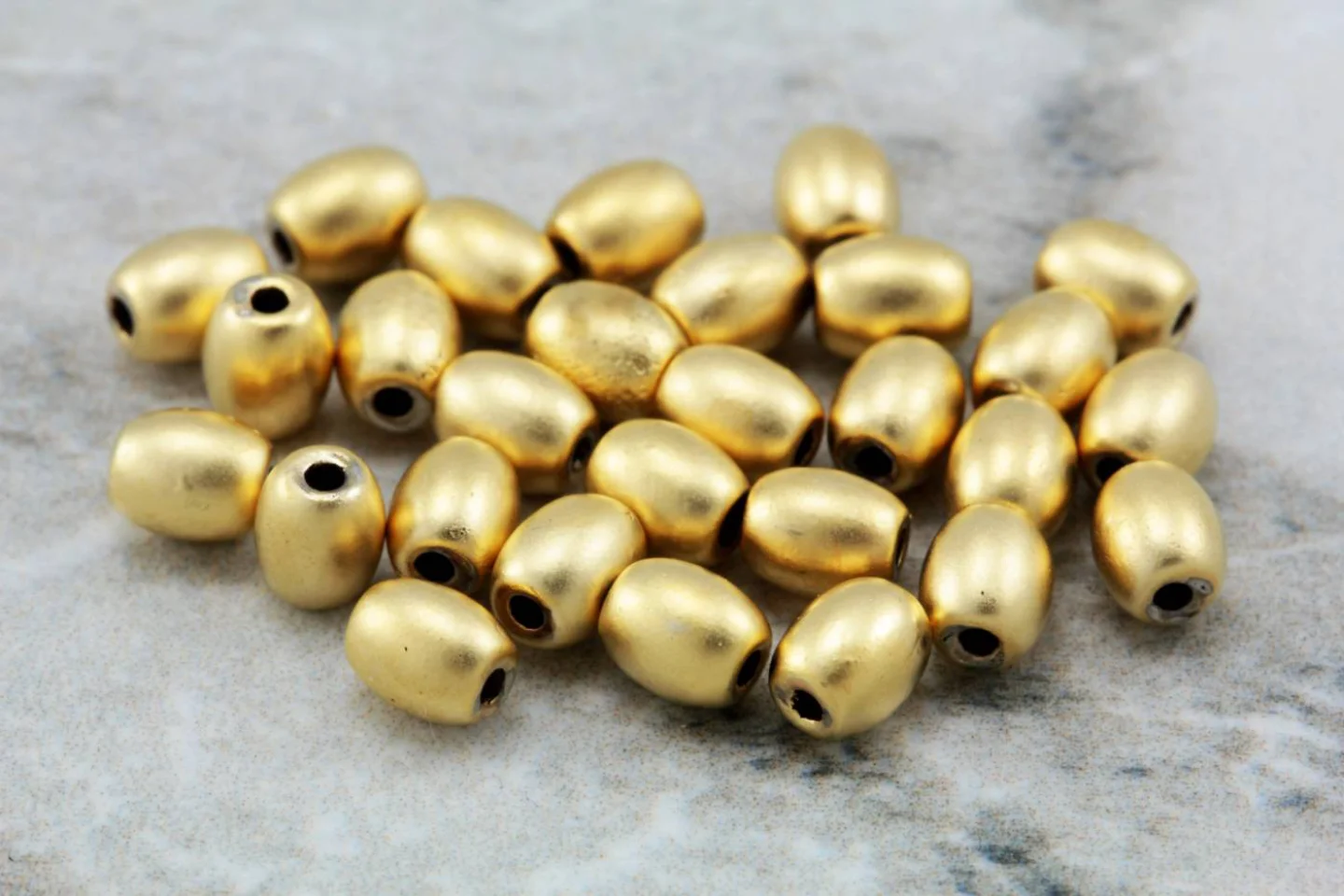 gold-plated-metal-mini-oval-spacer-beads.