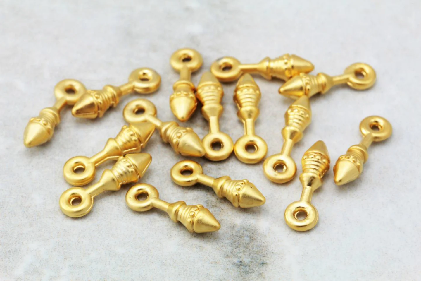 gold-plated-mini-tiny-bullet-pendants.
