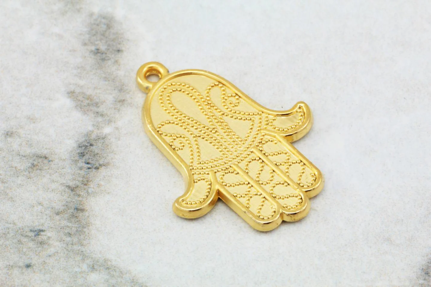 gold-hand-of-fatima-hamsa-pendants.