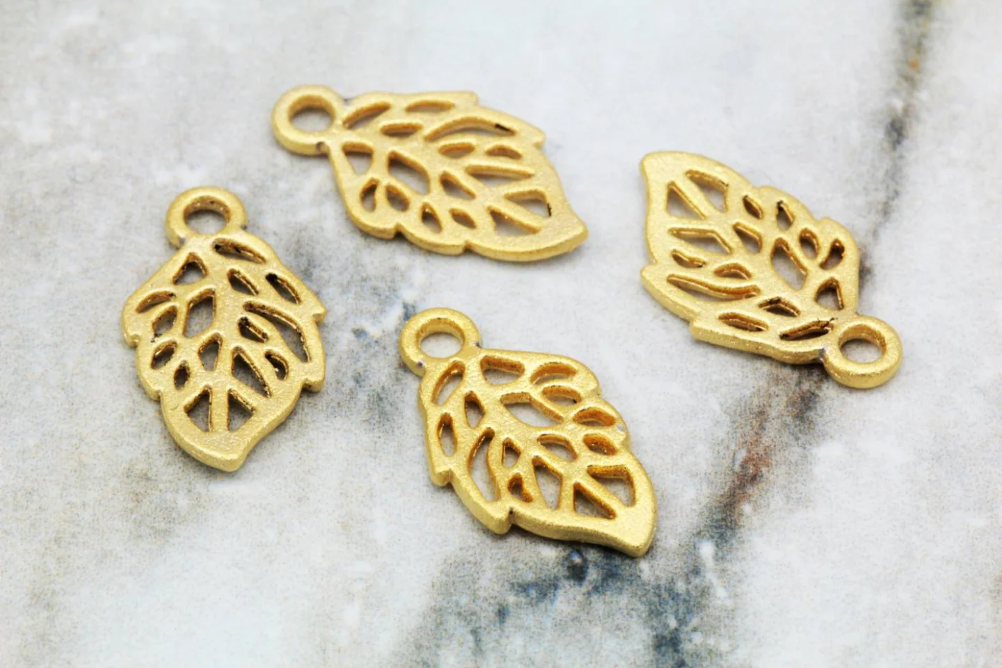 metal-gold-plated-tiny-leaf-pendants.