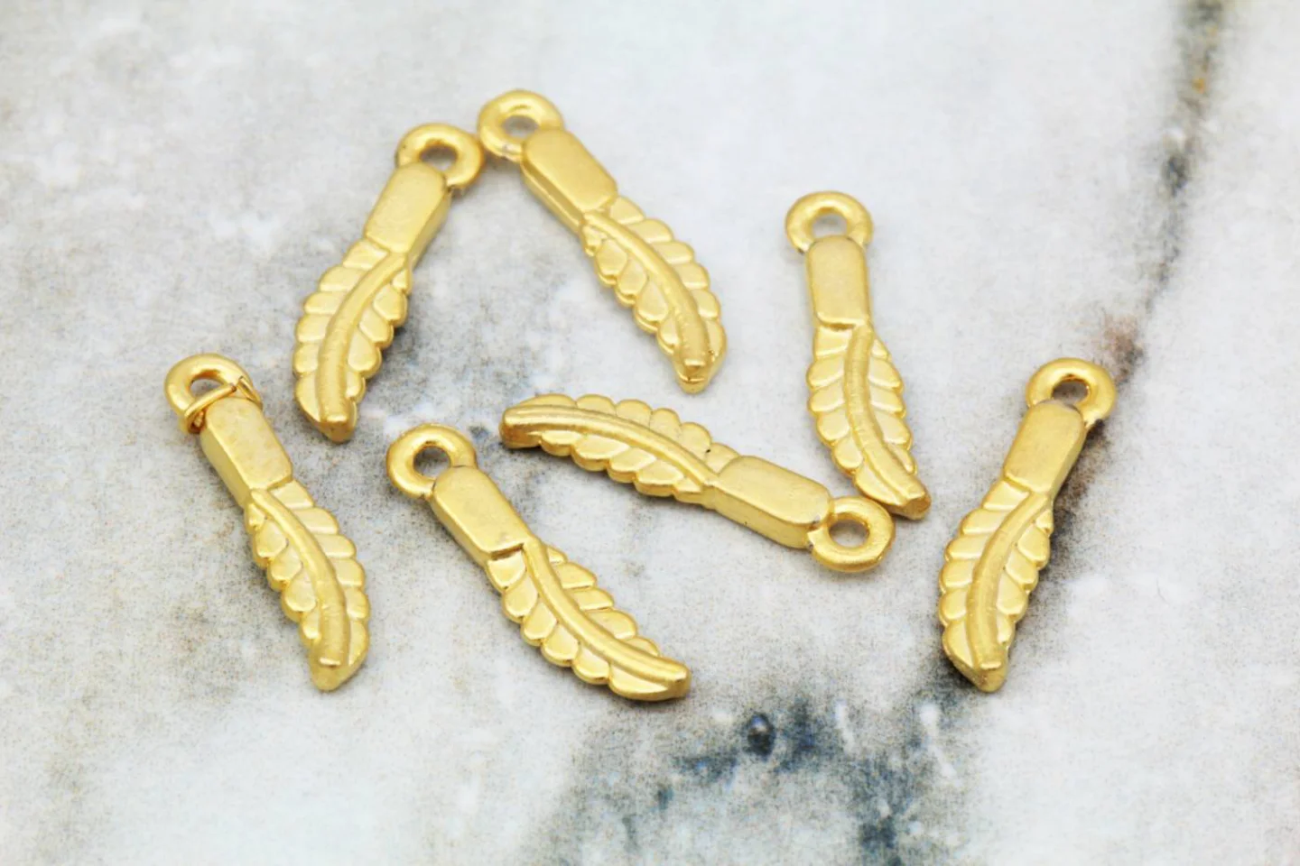 gold-plated-mini-feather-pendants.