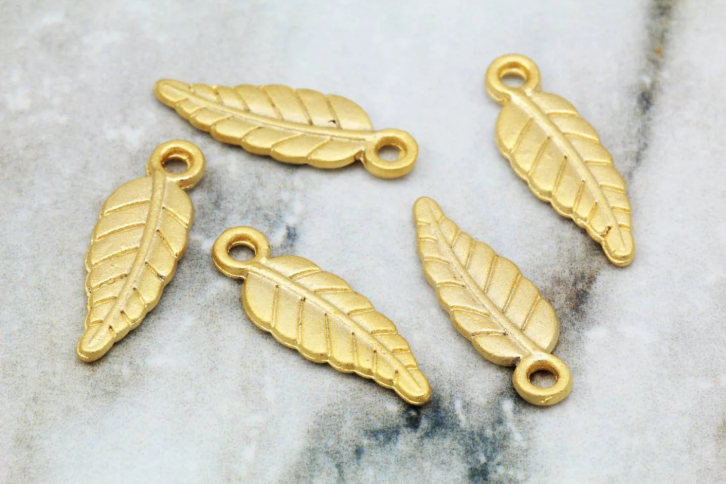 gold-plated-metal-small-leaf-pendants.