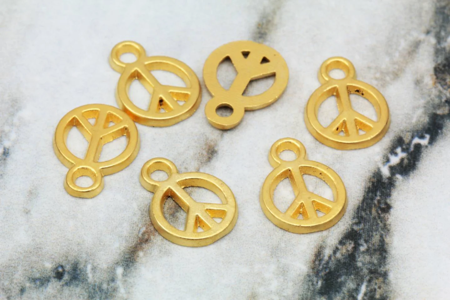gold-plated-small-peace-sign-pendants.