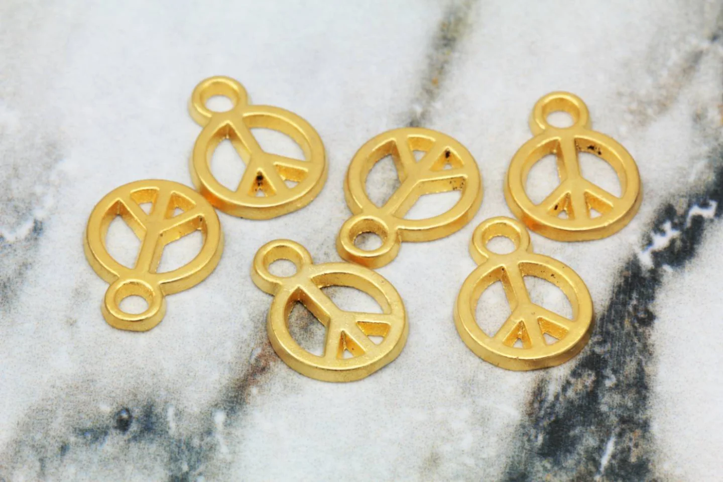 gold-metal-bohemian-peace-sign-pendants.