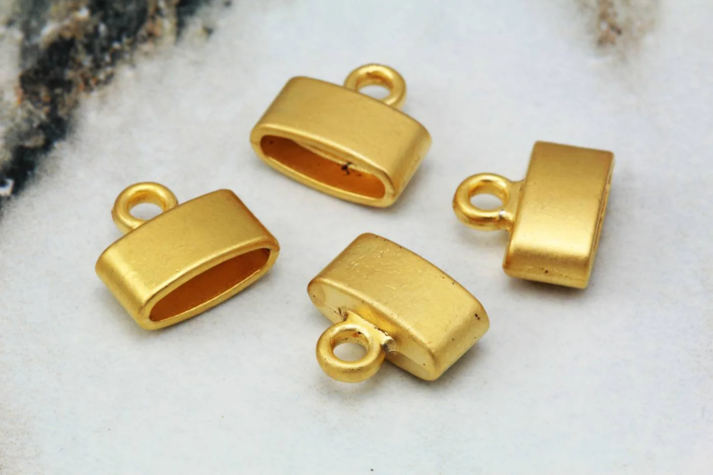 gold-metal-leather-cord-oval-end-caps.