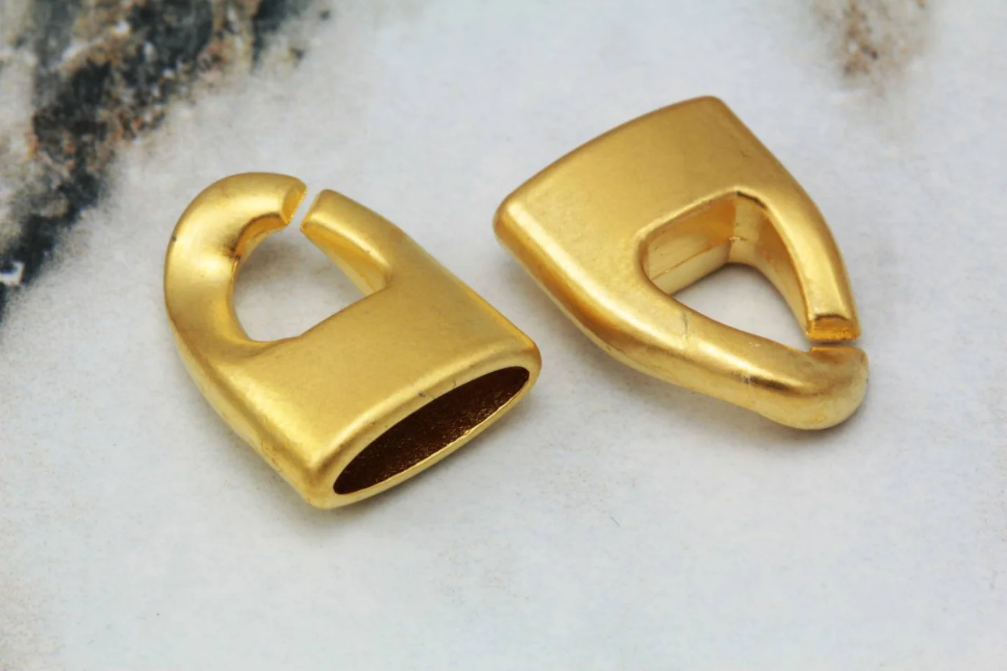 gold-metal-oval-leather-cord-end-clasps.