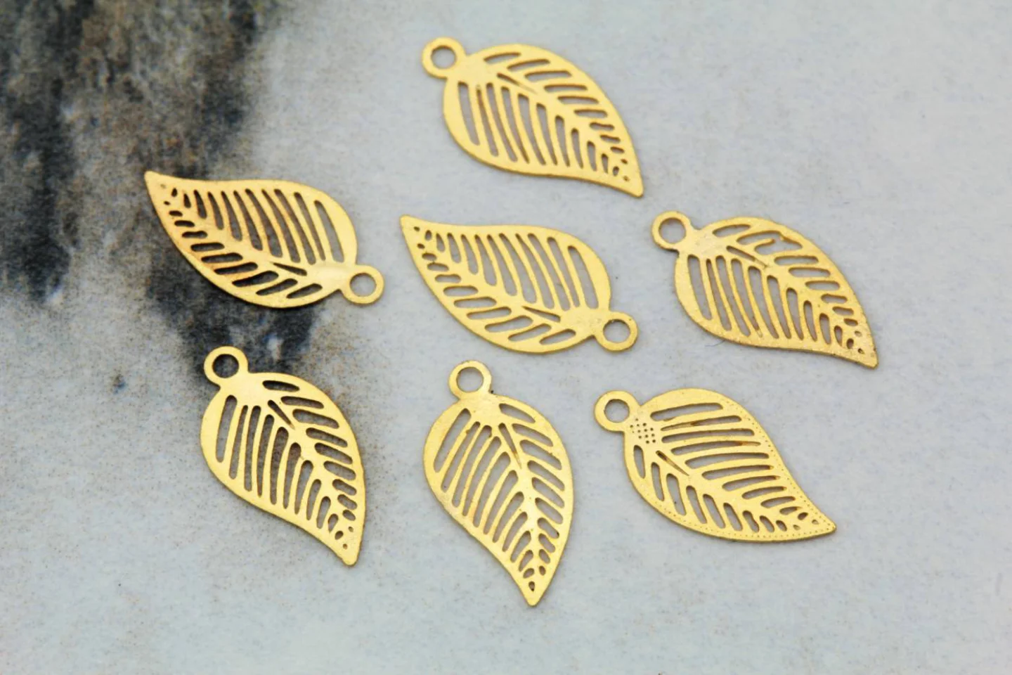 gold-brass-tiny-leaf-jewelry-pendants.