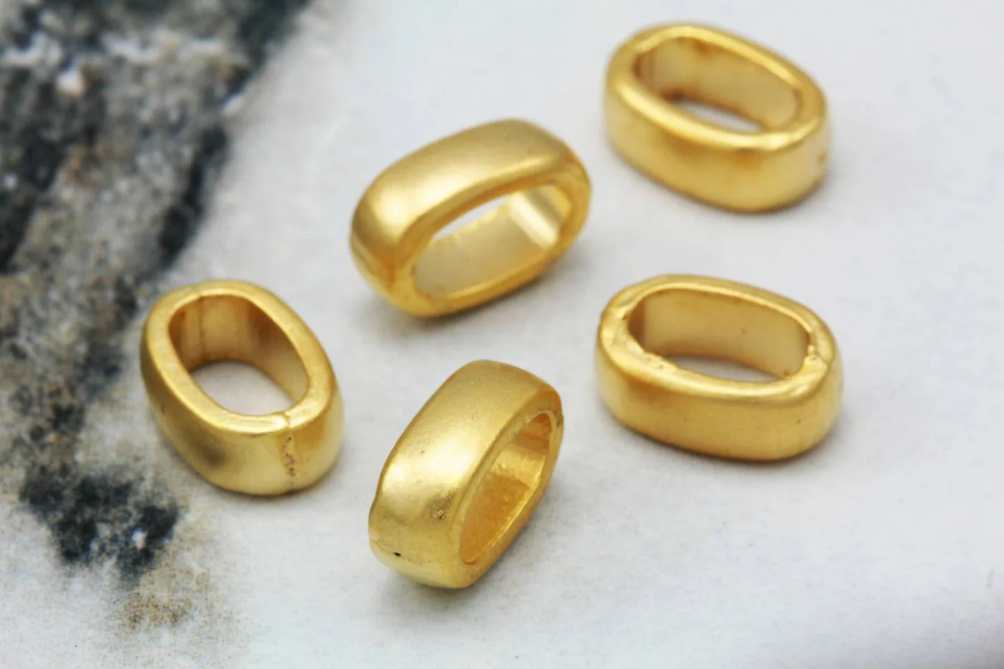 gold-oval-shape-charms-for-jewelry.
