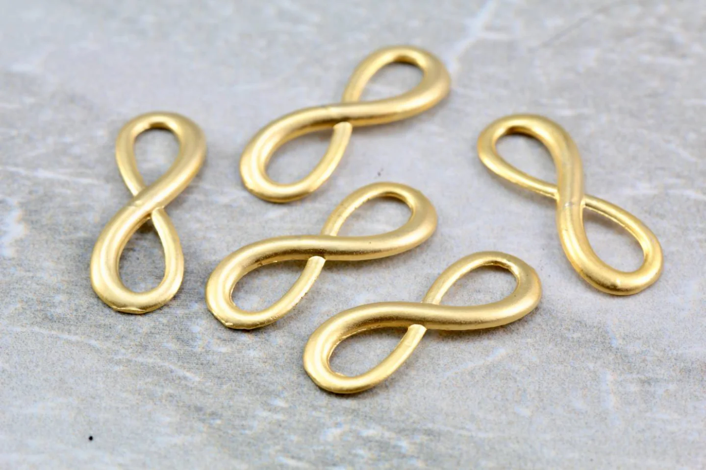 gold-metal-infinity-jewelry-charms.