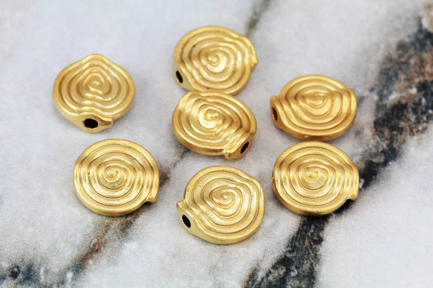 gold-plated-flat-round-tribal-charms.